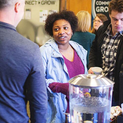 A Connect Church host serving coffee