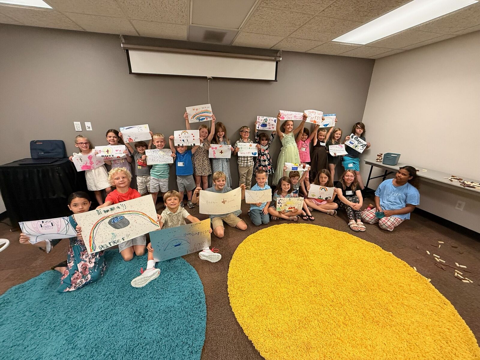Connect Kids class showing off their artwork